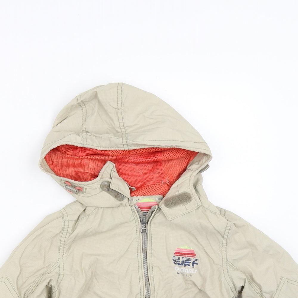 Close-up detail of Next boys’ beige jacket, size 3, years