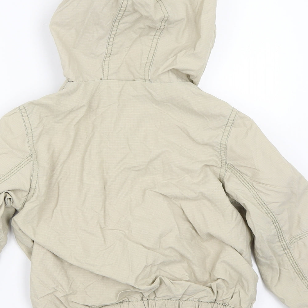 Brand and care label for Next boys’ beige jacket, size 3, years