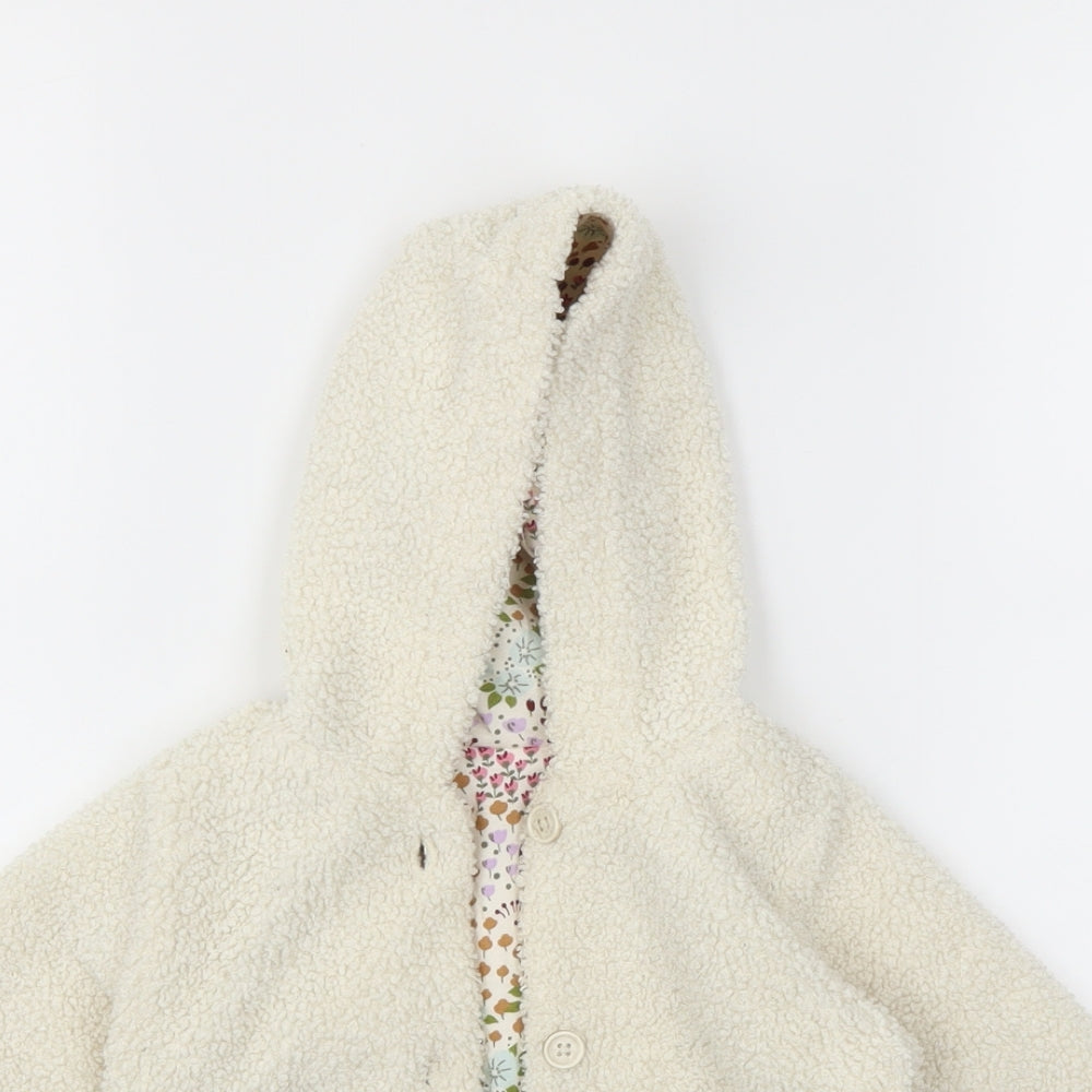 Close-up detail of Marks & Spencer girls’ ivory animal print basic jacket jacket, size 12, months