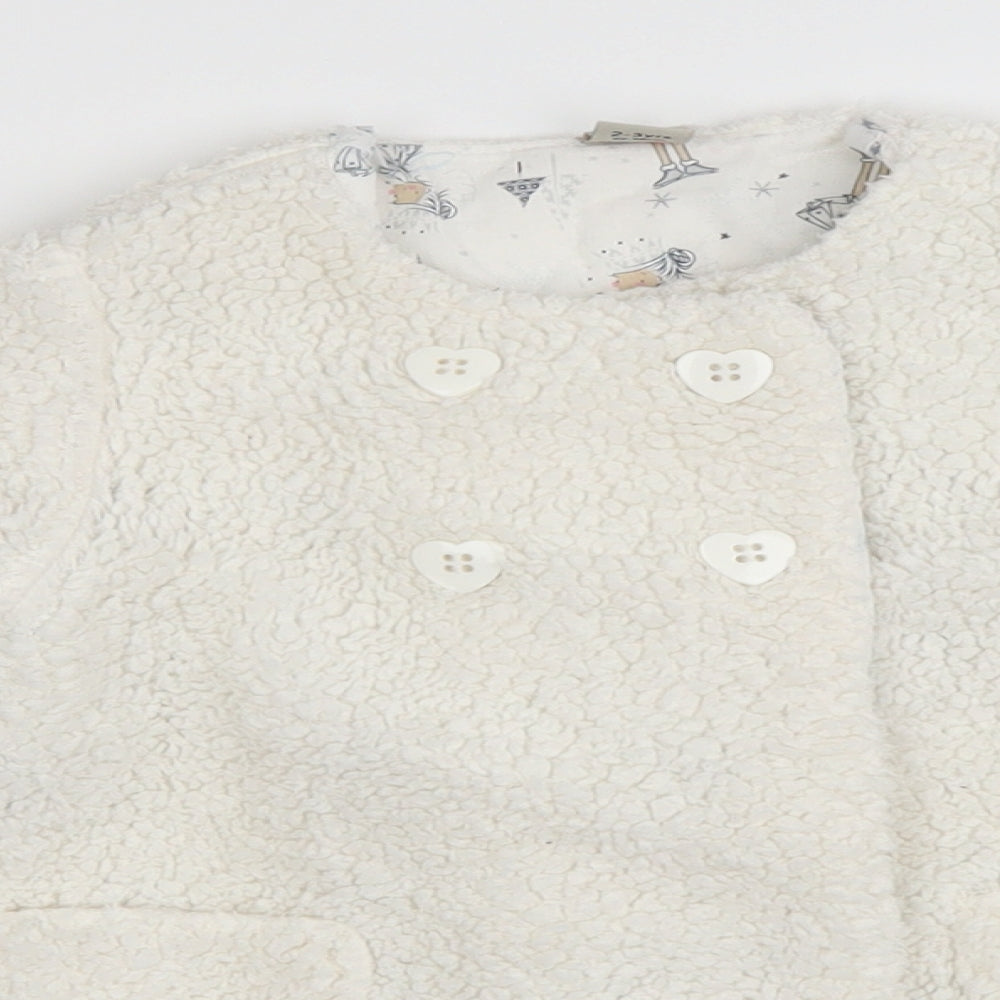 Close-up detail of Tu girls’ white basic coat coat, size 2-3, years