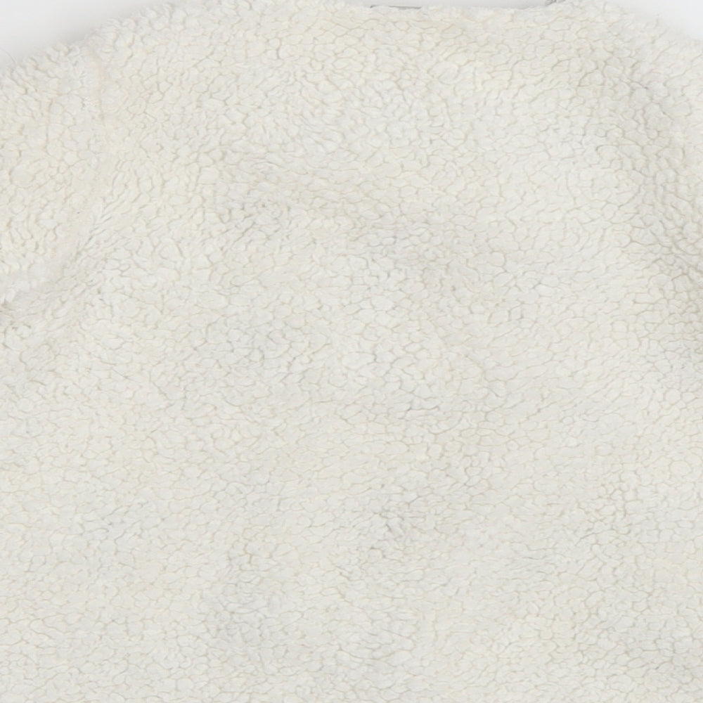 Brand and care label for Tu girls’ white basic coat coat, size 2-3, years