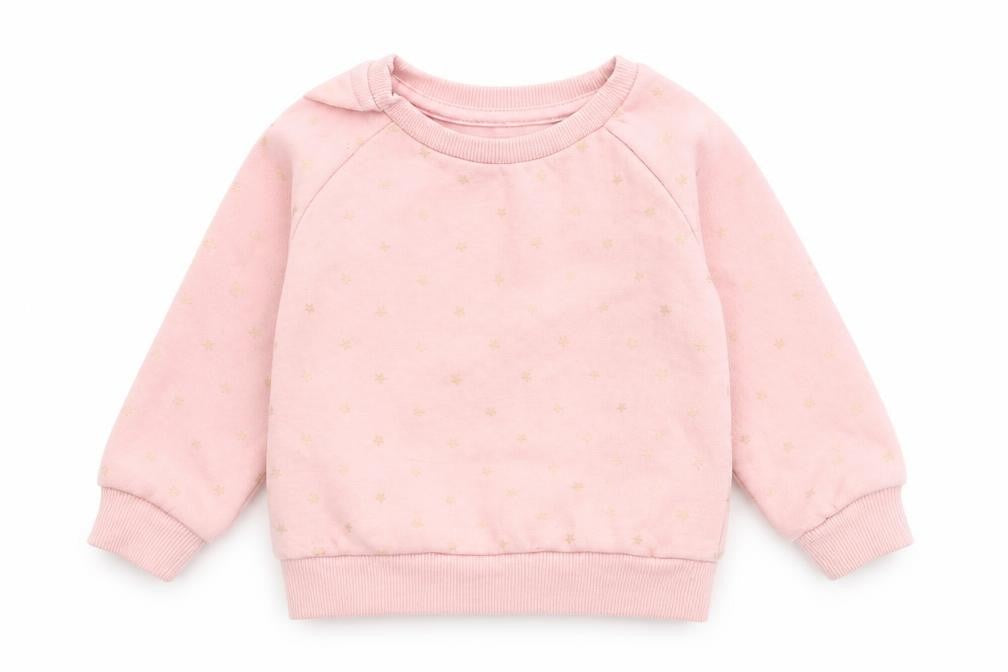 Front view of Primark girls’ pink polka dot jumper, size 9-12, months