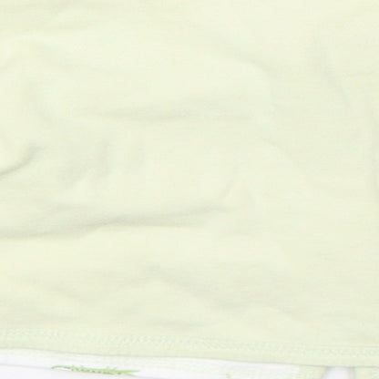 Brand and care label for Gap girls’ green jumper, size 0-3, months