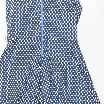 Brand and care label for Vacknox women’s blue polka dot a-line, size UK 12