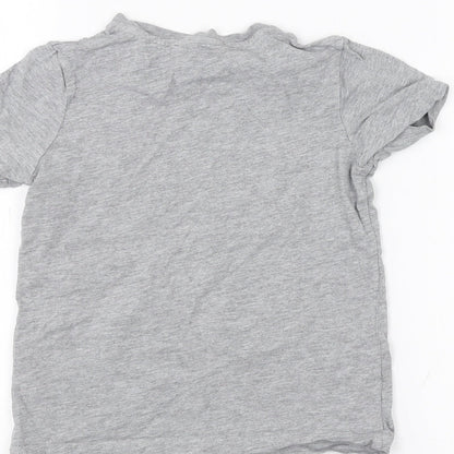 Brand and care label for Tu girls’ grey basic t-shirt, size 3-4, years