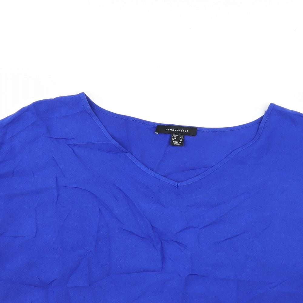 Close-up detail of Atmosphere women’s blue basic blouse, size UK 14