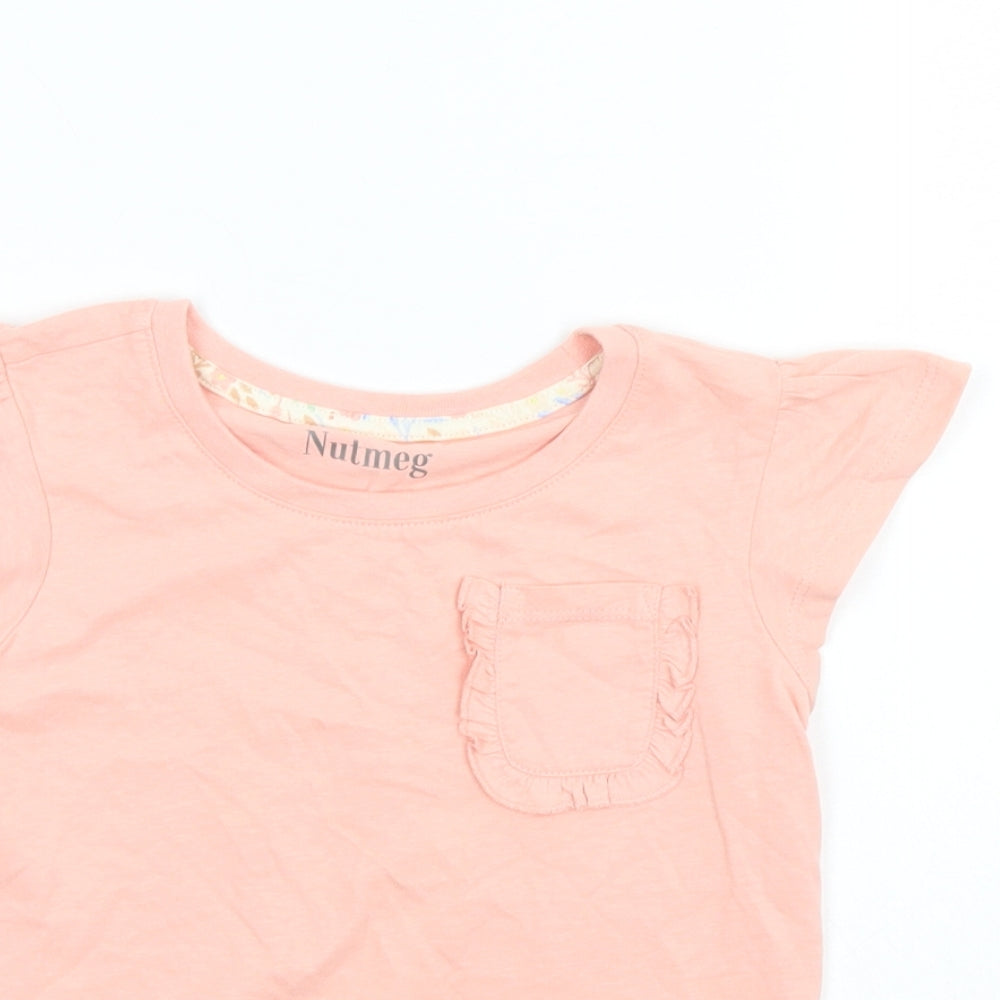 Close-up detail of Nutmeg girls’ pink basic polo, size 5-6, years