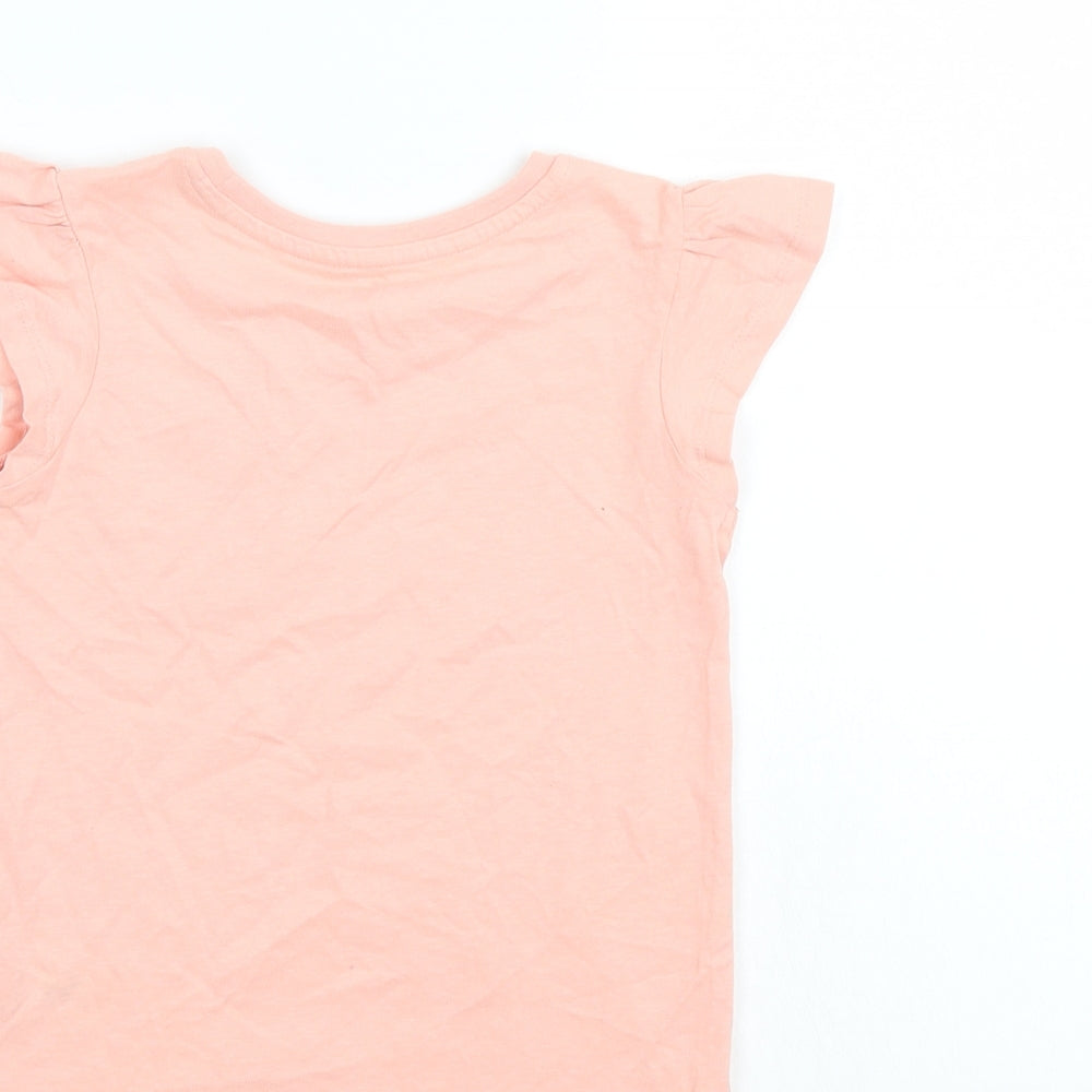 Brand and care label for Nutmeg girls’ pink basic polo, size 5-6, years