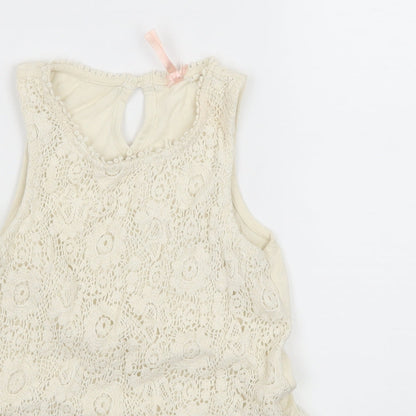 Close-up detail of Next girls’ ivory jersey basic tank, size 8, years