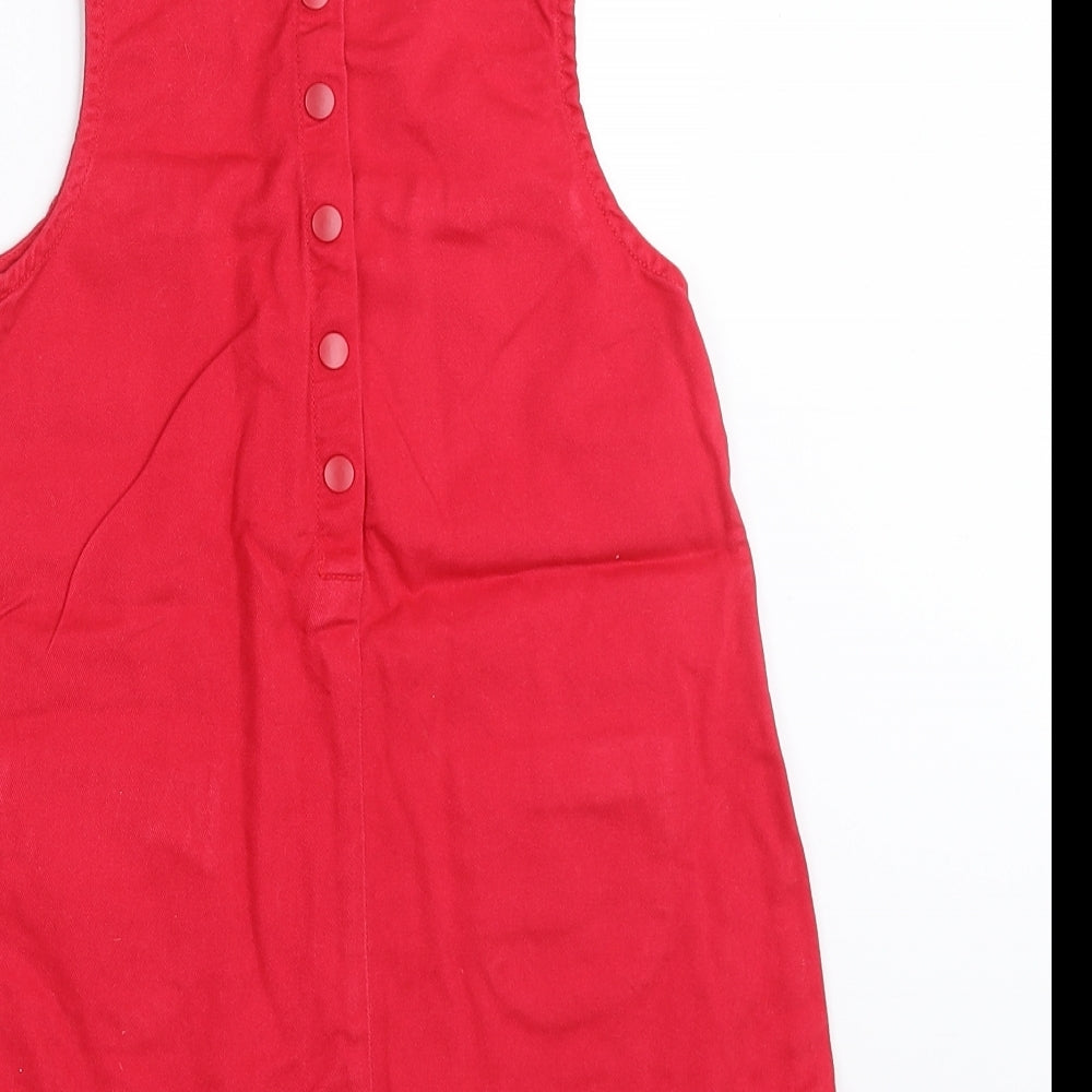Brand and care label for H&M girls’ red shift, size 18-24, months