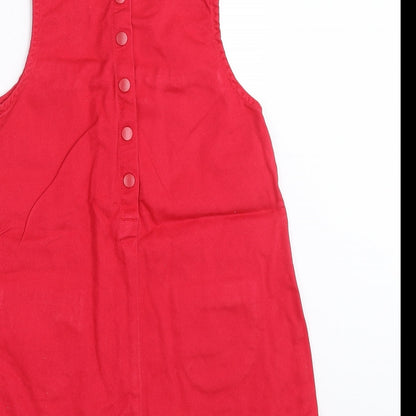 Brand and care label for H&M girls’ red shift, size 18-24, months