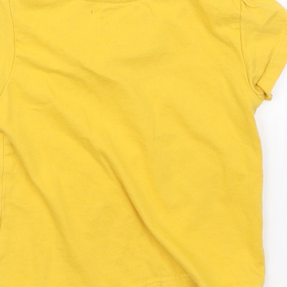 Brand and care label for Primark girls’ yellow basic t-shirt, size 6-9, months