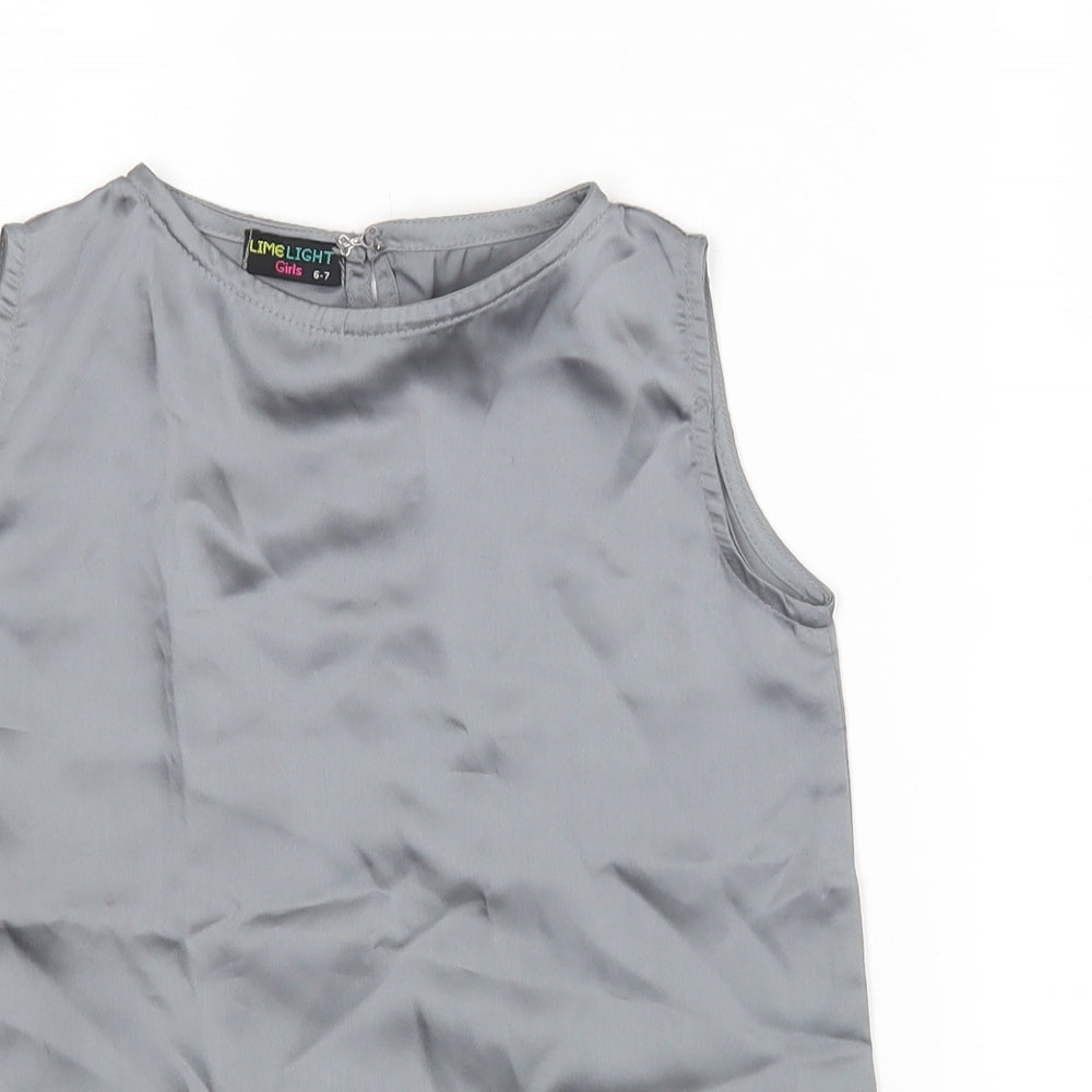 Close-up detail of Lime Light girls’ silver basic blouse, size 6-7, years
