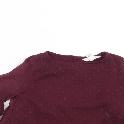 Close-up detail of River Island girls’ purple basic blouse, size 3-6, months