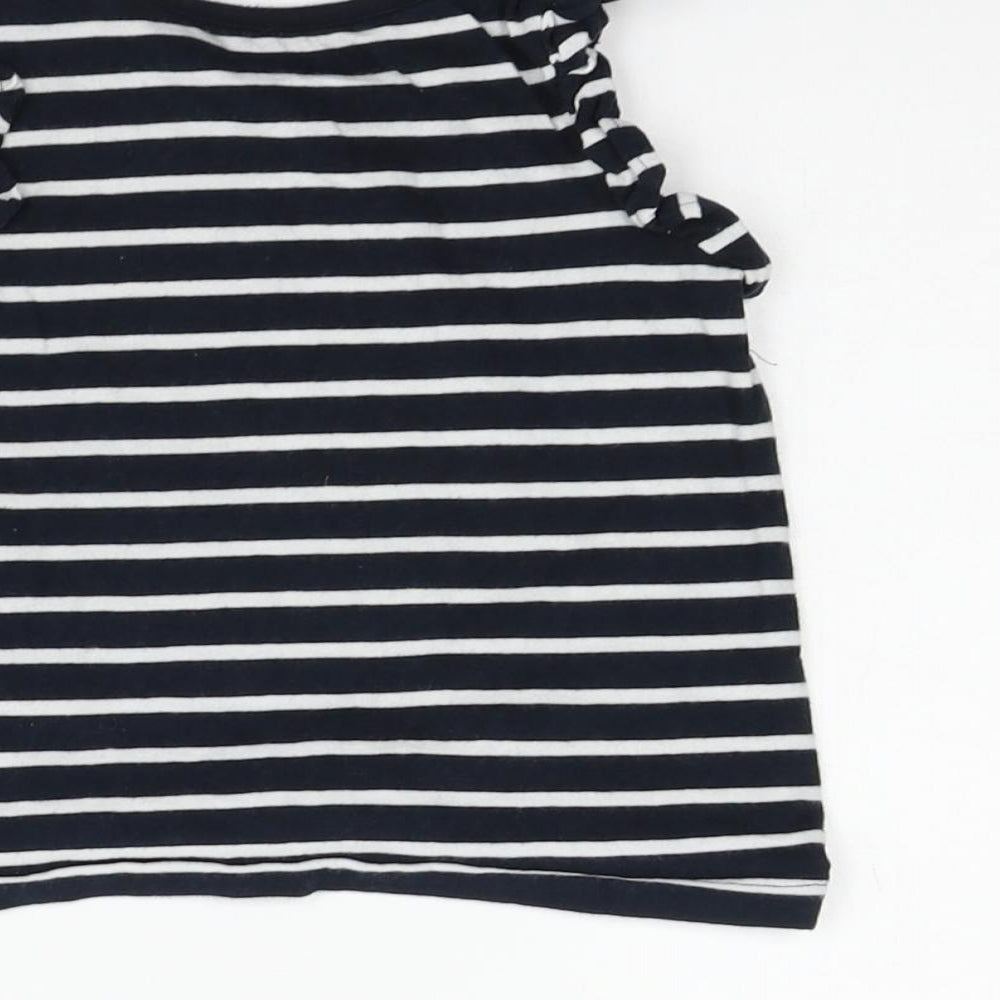 Brand and care label for Next boys’ black striped basic tank, size 12-18, months
