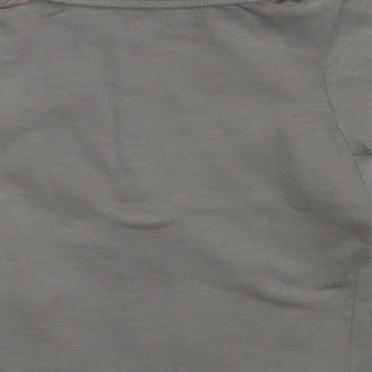 Brand and care label for George boys’ ivory pullover polo, size 0-3, months