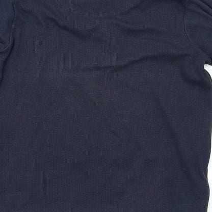 Brand and care label for Next girls’ blue basic blouse, size 7, years