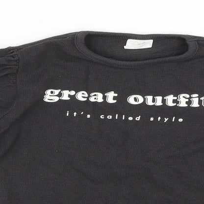 Close-up detail of Zara girls’ black basic t-shirt, size 8, years