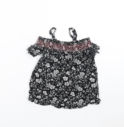 Front view of Matalan girls’ black floral basic blouse, size 8, years