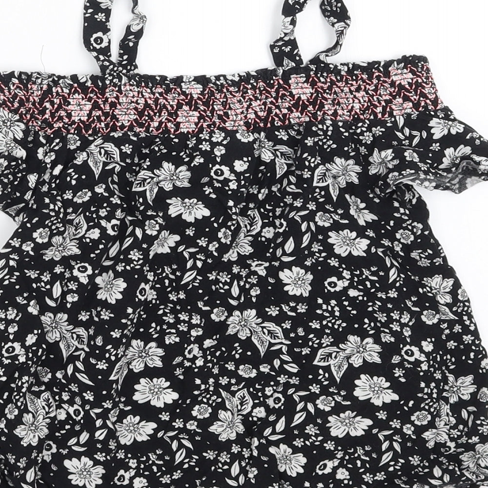 Brand and care label for Matalan girls’ black floral basic blouse, size 8, years
