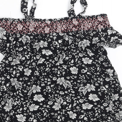 Brand and care label for Matalan girls’ black floral basic blouse, size 8, years