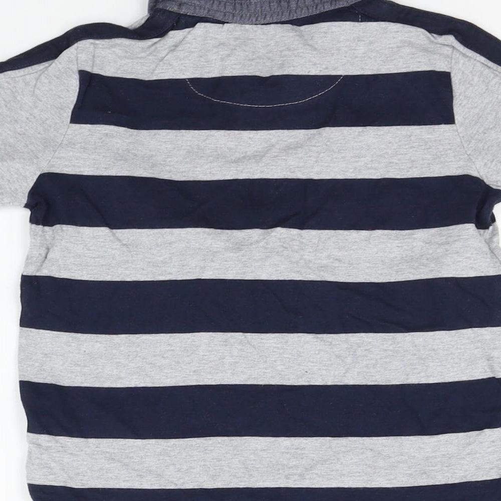 Brand and care label for Tu girls’ grey striped basic polo, size 3-4, years