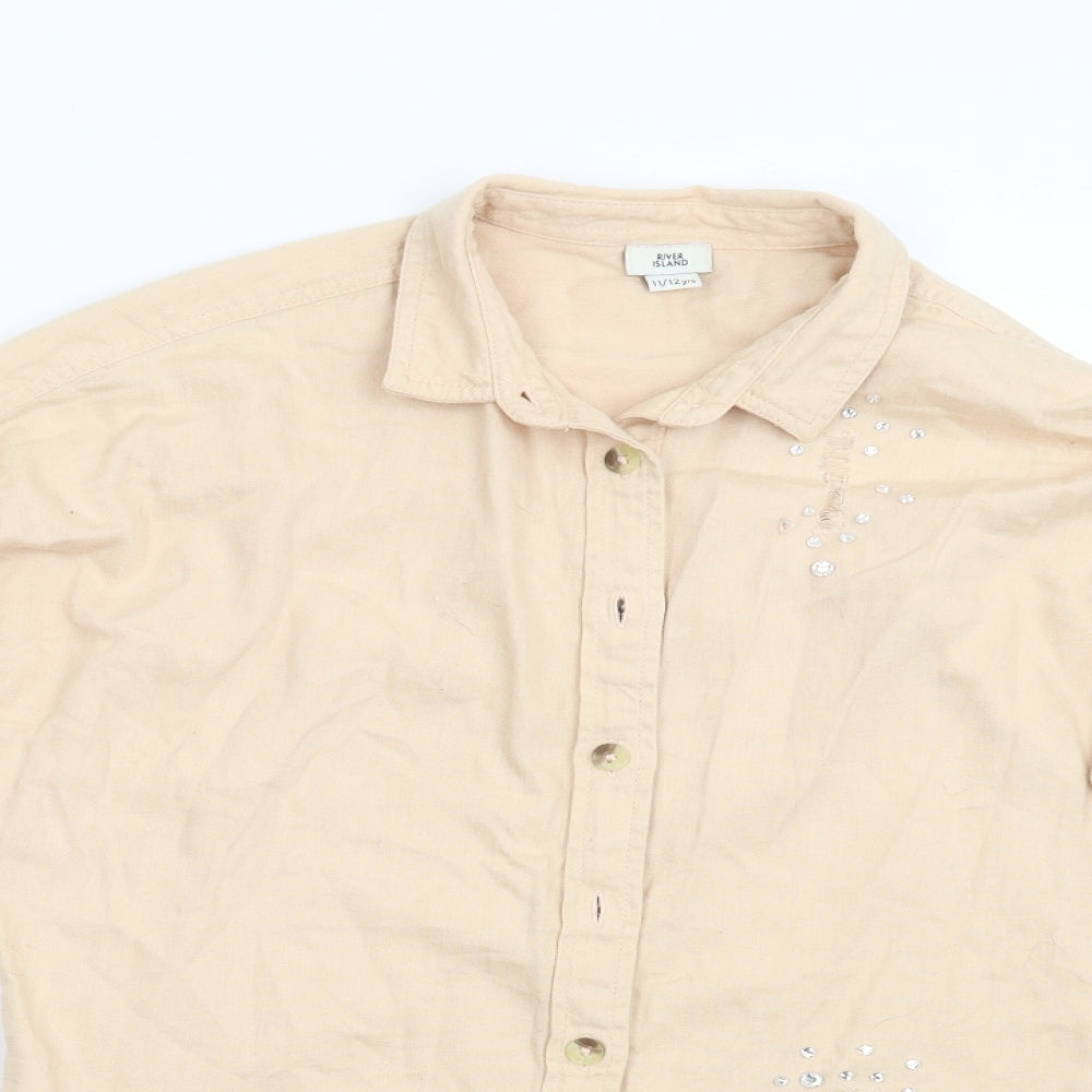 Close-up detail of River Island girls’ beige denim basic button-up, size 11-12, years