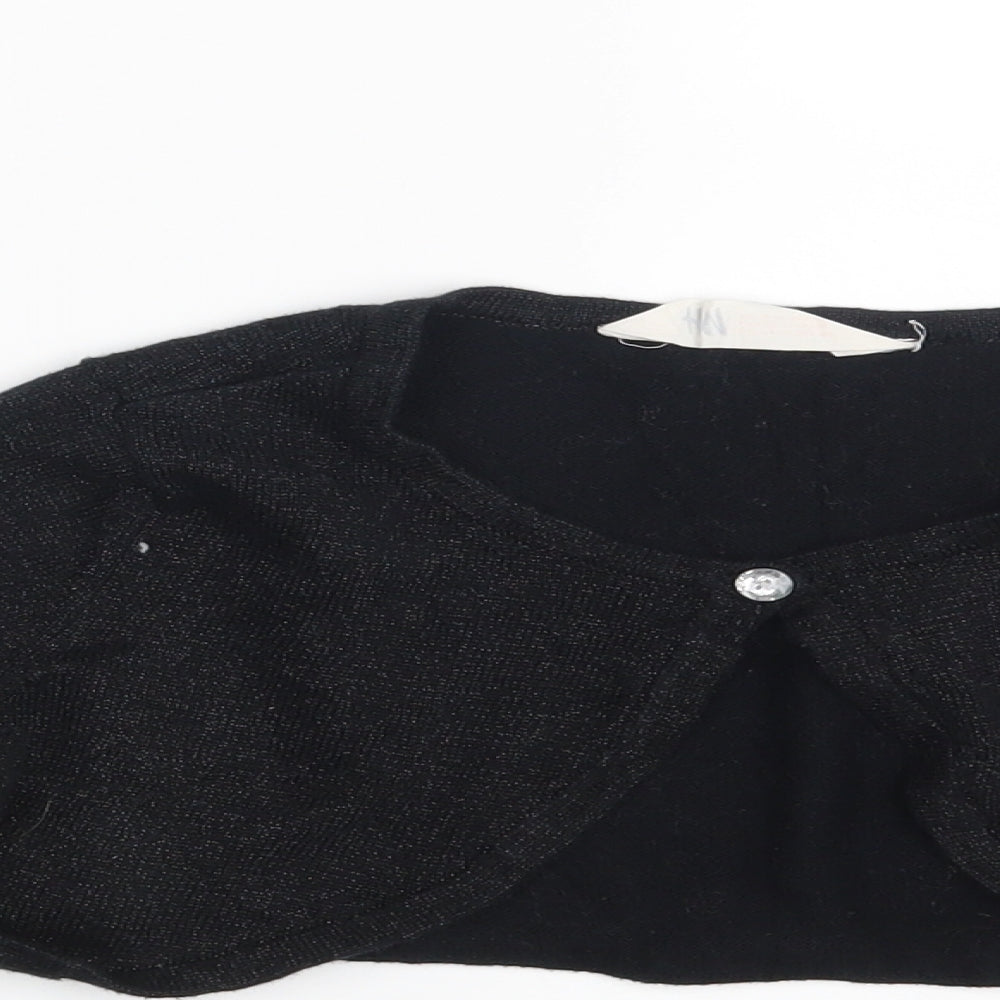 Close-up detail of H&M girls’ black basic blouse, size 8-9, years