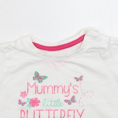 Close-up detail of Primark girls’ white basic t-shirt, size 6-9, months
