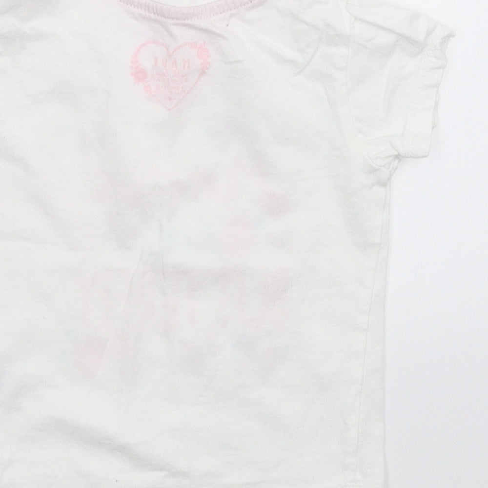 Brand and care label for Primark girls’ white basic t-shirt, size 6-9, months