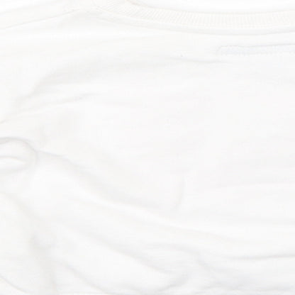 Brand and care label for Primark girls’ white jumper, size 12-18, months