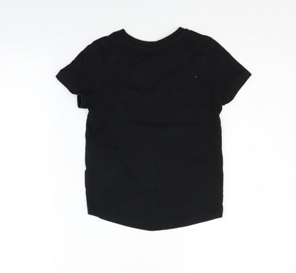 Back view of Nutmeg girls’ black basic t-shirt, size 6-7, years