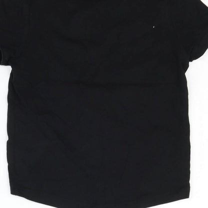 Brand and care label for Nutmeg girls’ black basic t-shirt, size 6-7, years