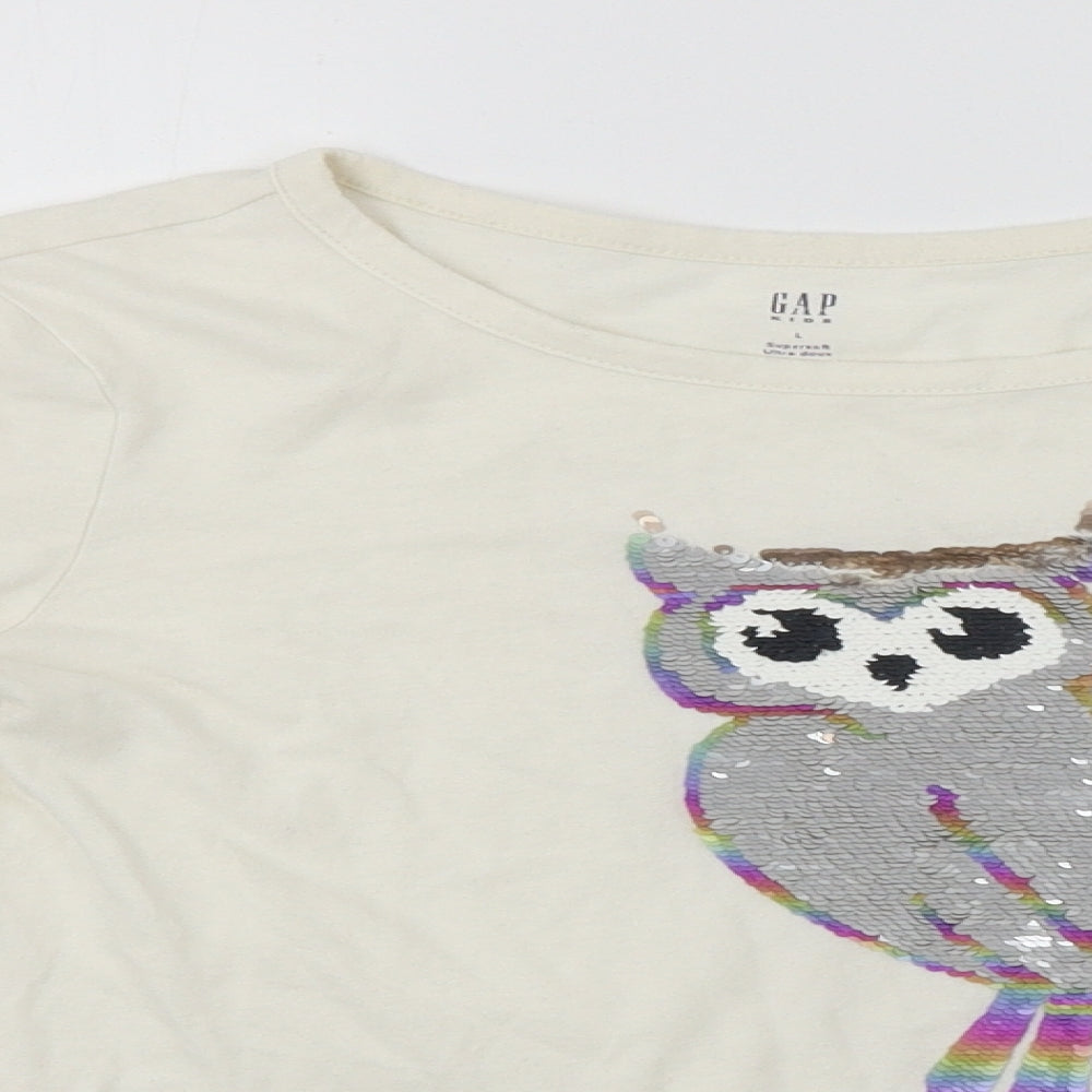 Close-up detail of Gap girls’ white basic t-shirt, size L, - sequin detail