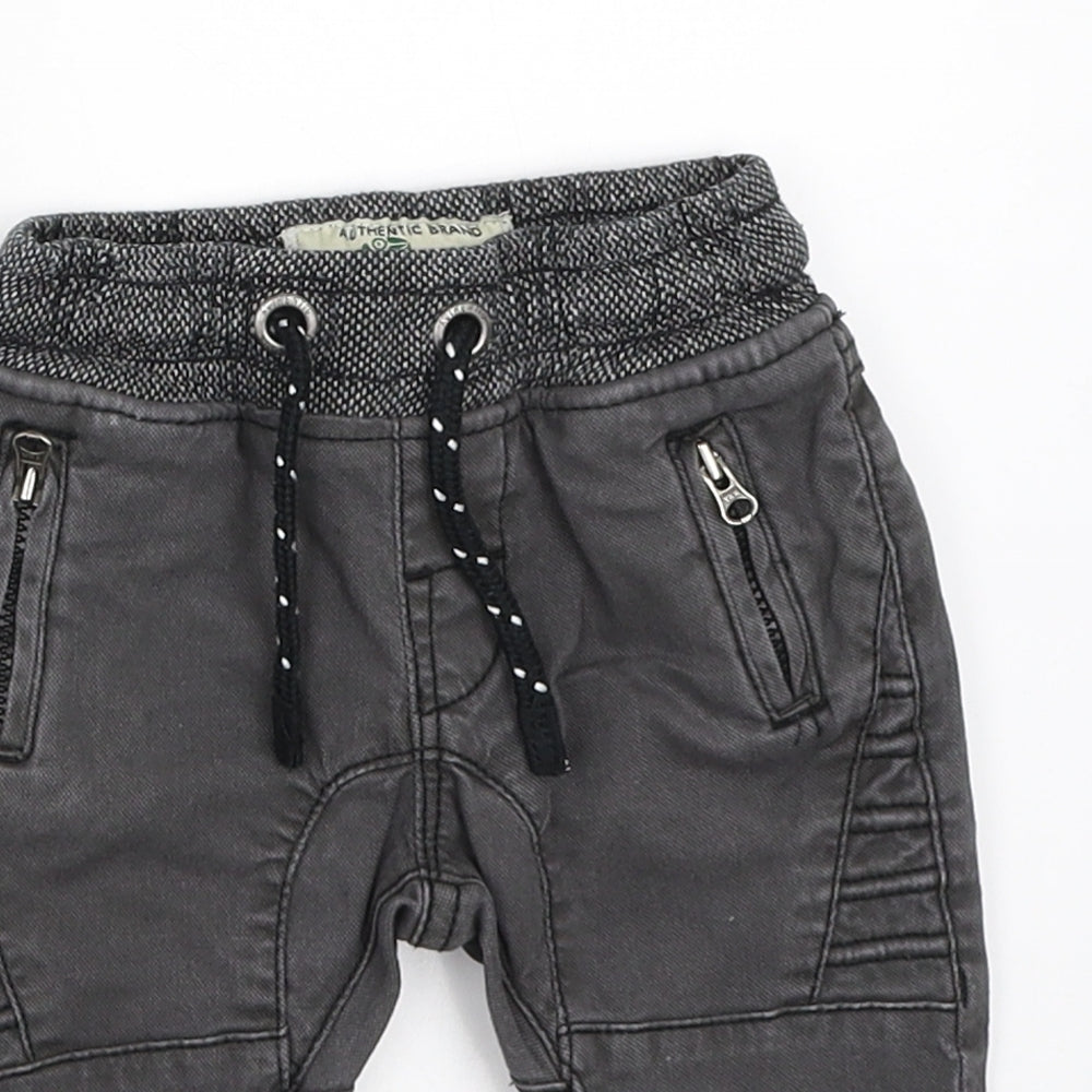 Close-up detail of Next boys’ grey jogger jeans, size 3-6, months