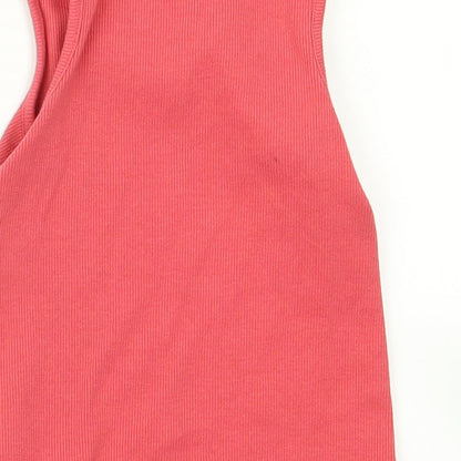 Brand and care label for Next girls’ pink rayon basic tank, size 4, years
