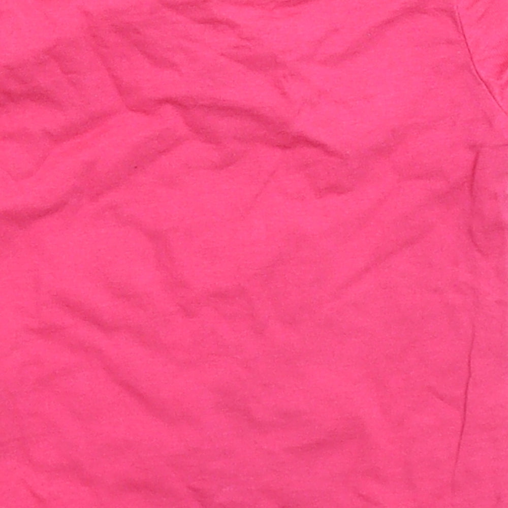 Brand and care label for Primark girls’ pink basic t-shirt, size 6-9, months