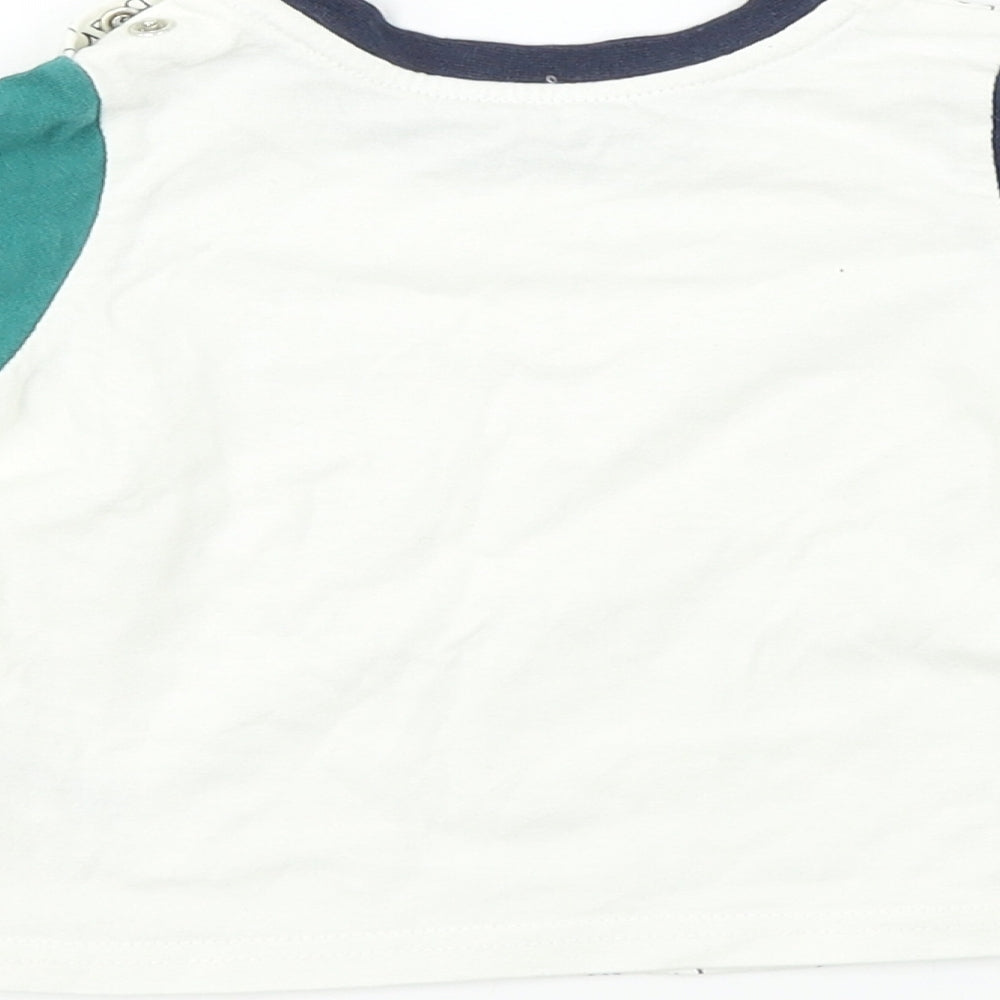 Brand and care label for Nutmeg Baby White Basic T-Shirt, size 6-9, Months