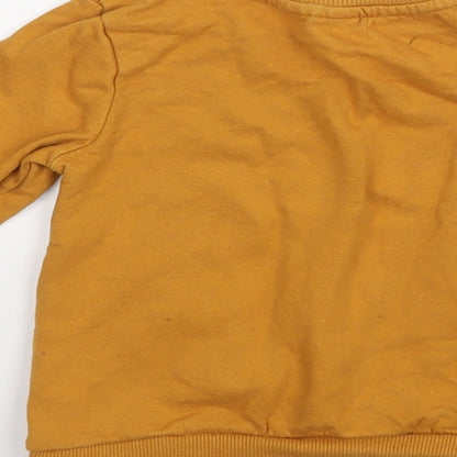 Brand and care label for So Cute boys’ yellow jumper, size 12-18, months