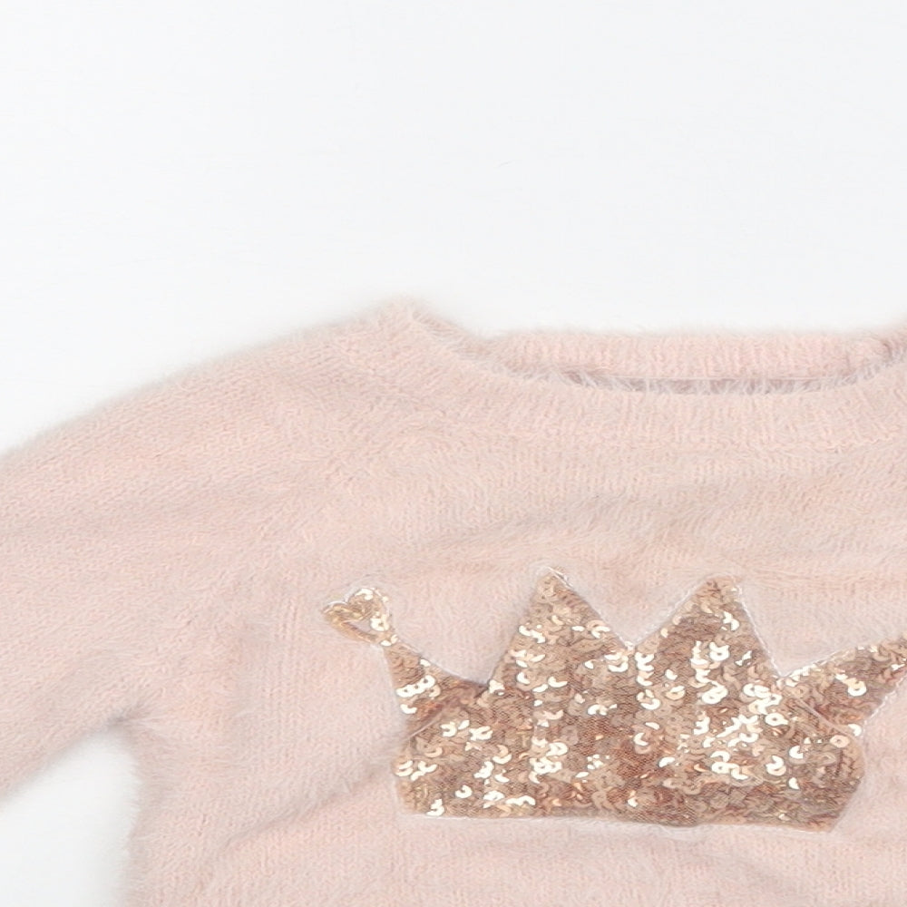 Close-up detail of Primark girls’ pink jumper, size 6-9, months
