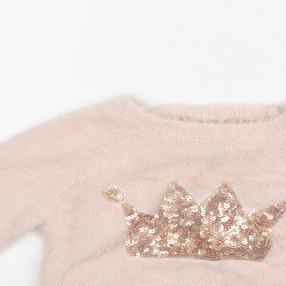 Close-up detail of Primark girls’ pink jumper, size 6-9, months
