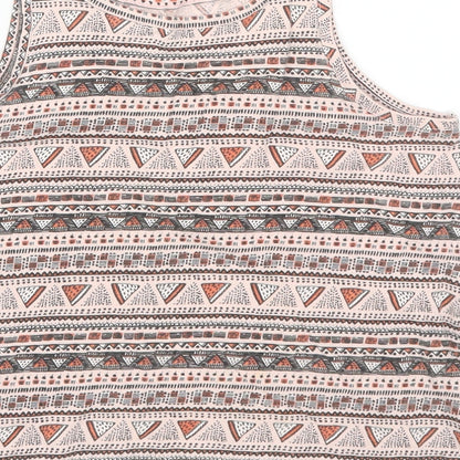 Brand and care label for Pep&Co girls’ pink geometric basic tank, size 9, years