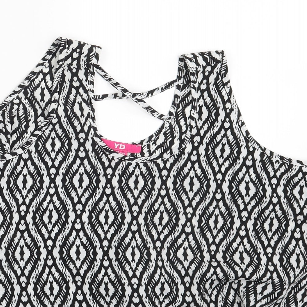 Close-up detail of YD girls’ black argyle/diamond basic blouse, size 11-12, years