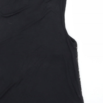 Brand and care label for Young Dimension girls’ black basic blouse, size 11, years