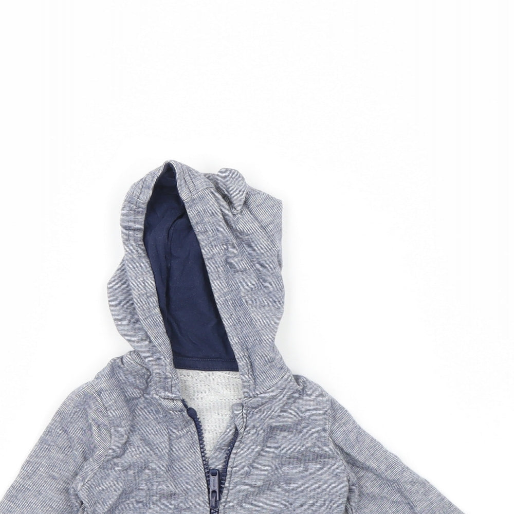 Close-up detail of George boys’ blue jacket, size 0-3, months