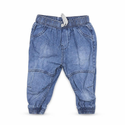 Front view of Nutmeg Blue Denim Jogger Jeans, size 12-18, Months - Elastic Waist