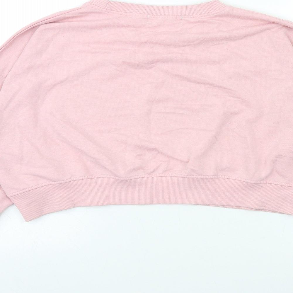 Brand and care label for Missguided women’s pink pullover sweatshirt, size UK 16