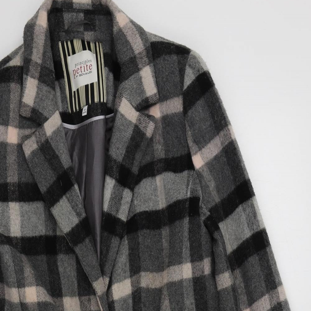 Close-up detail of Prinsiples women’s black check overcoat coat