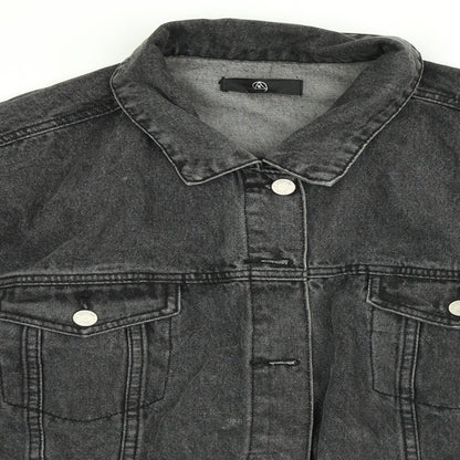 Close-up detail of Misguided women’s black jacket, size UK 10