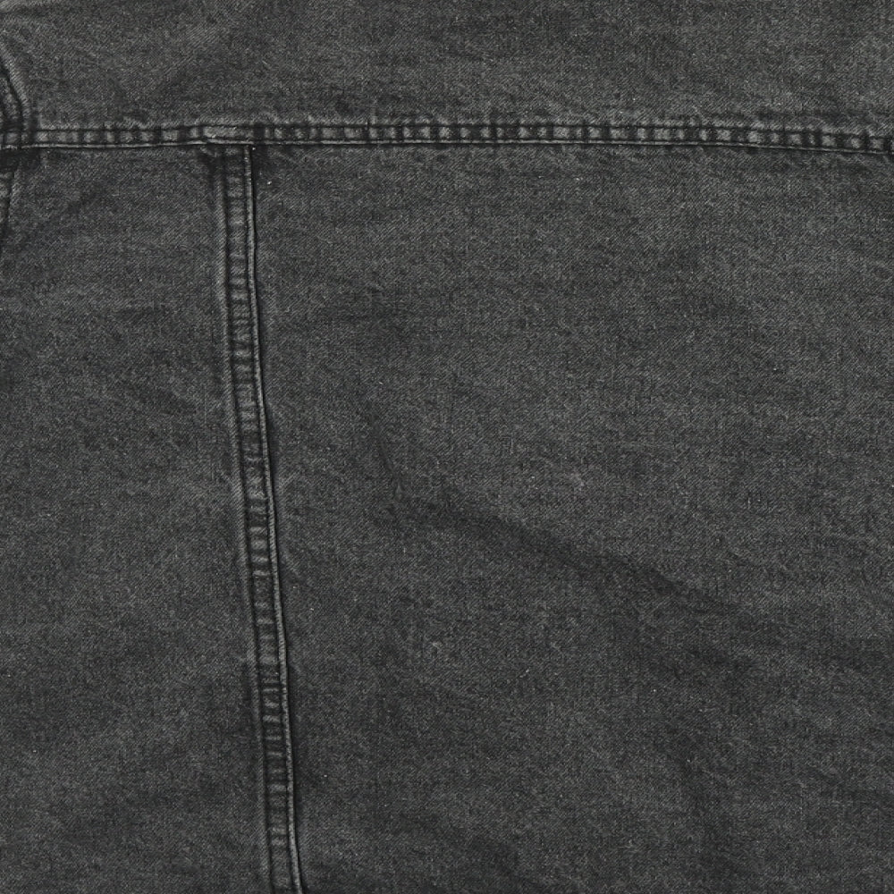 Brand and care label for Misguided women’s black jacket, size UK 10